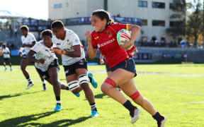 Spain's Amaia Erbina races away from the Fiji defence during the Challenge Trophy final.