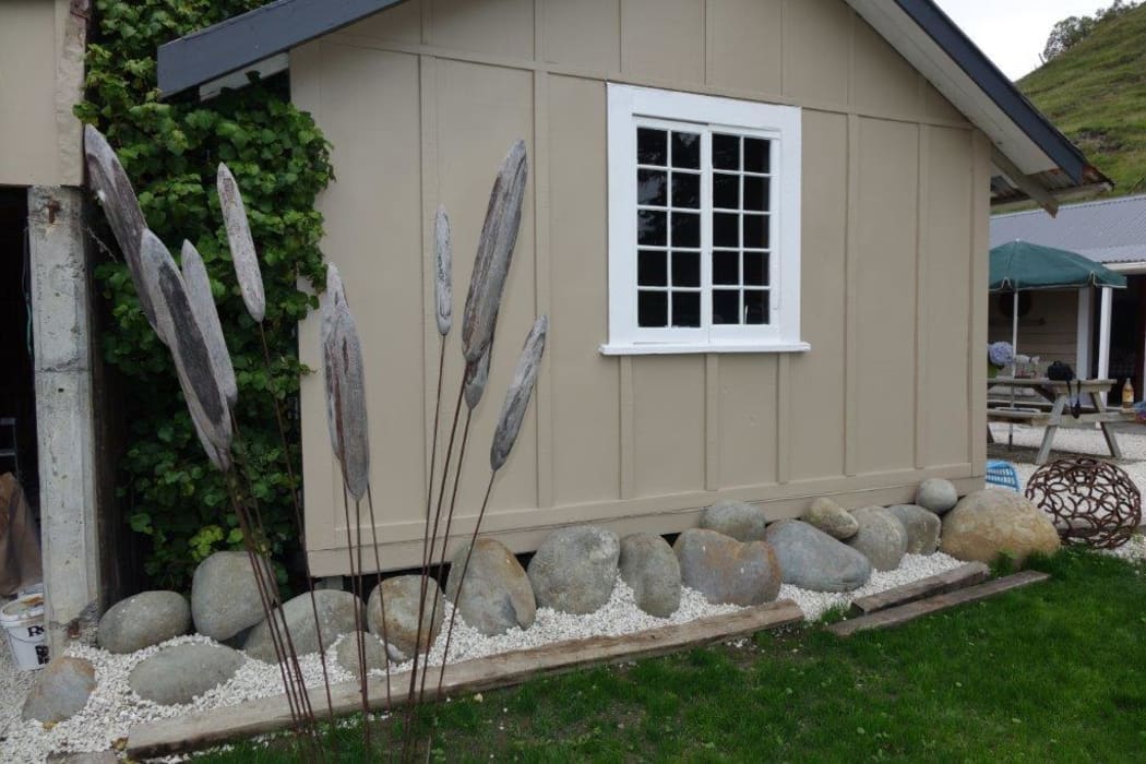 Boulders used to landscape the exterior of the Todhunters' new home, which was once the shearing quarters.