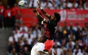 Fiji's lock Isoa Nasilasila (R) and England's lock Maro Itoje (L) jump for the ball in a line out during the France 2023 Rugby World Cup quarter-final match between England and Fiji at the Velodrome Stadium in Marseille, southeastern France, on October 15, 2023.
