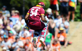 Lendl Simmons celebrates his century