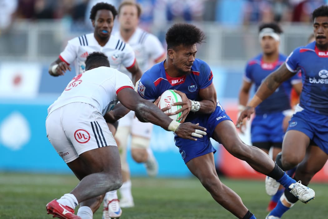 Samoa's Joe Perez challenges the USA defence during the Cup final in Las Vegas.