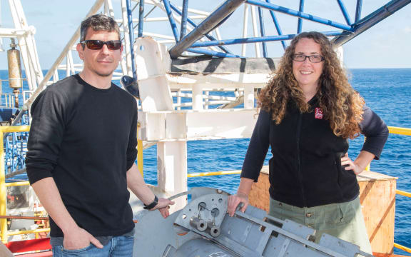 Laura Wallace and Demian Saffer on the JOIDES Resolution with one of two sub-seafloor earthquake observatories that have been placed on the Hikurangi subduction zone.
