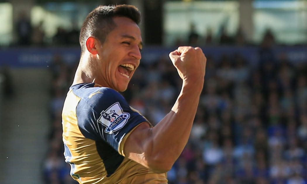 Alexis Sanchez of Arsenal celebrates scoring a goal.