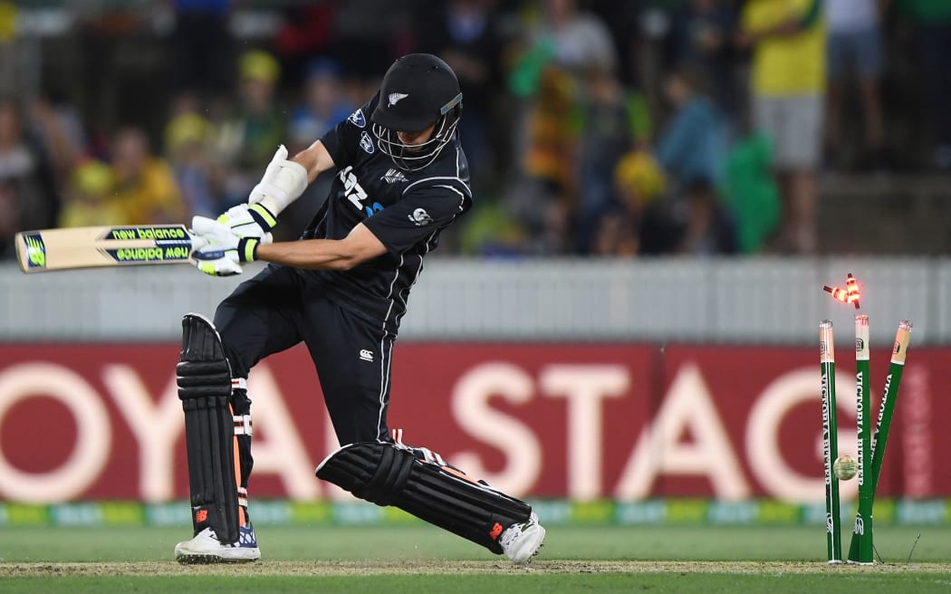 Mitchell Santner is bowled during the second ODI between the Black Caps and Australia.