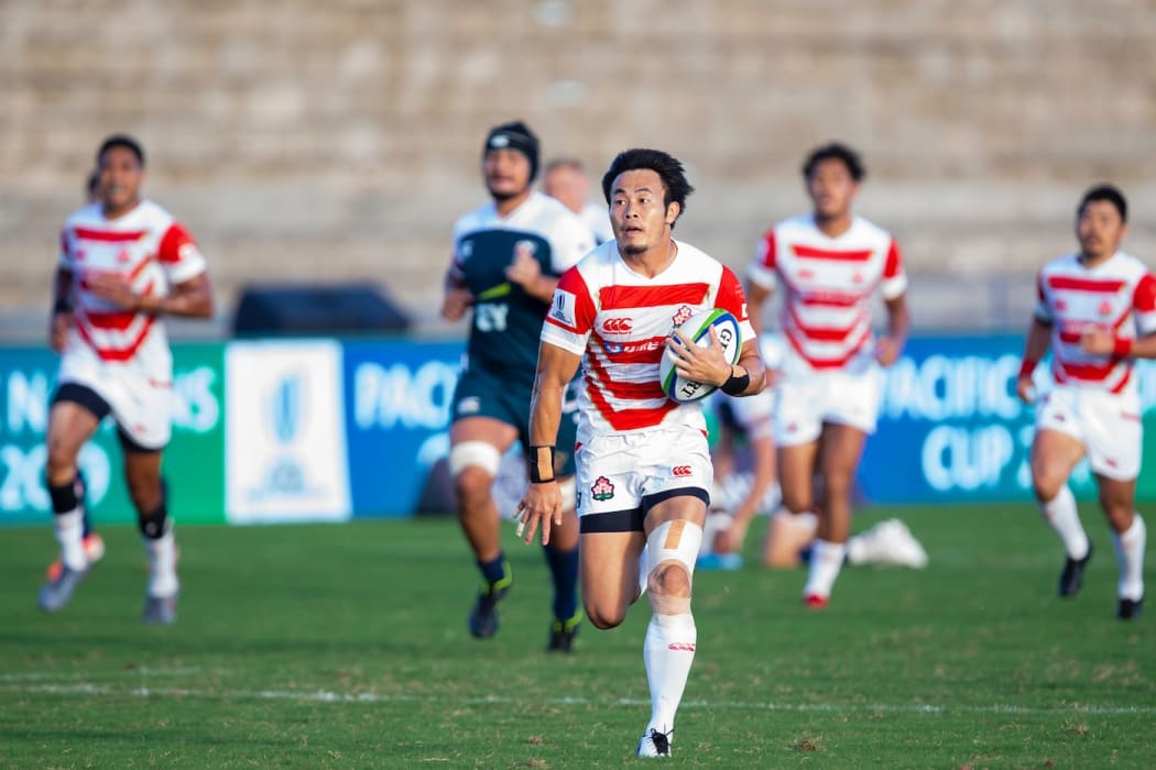 Japan wing Kenki Fukuoka races away to score against the USA in Suva