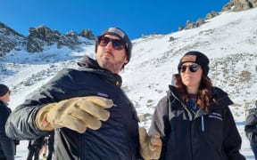 NZSki chief executive Paul Anderson and Prime Minister Jacinda Ardern at The Remarkables skifield at the start of the ski season on 18 June 2022.