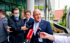 National Party leader Christopher Luxon speaks to media outside the National Party's annual conference in Christchurch on 6 August, 2022.