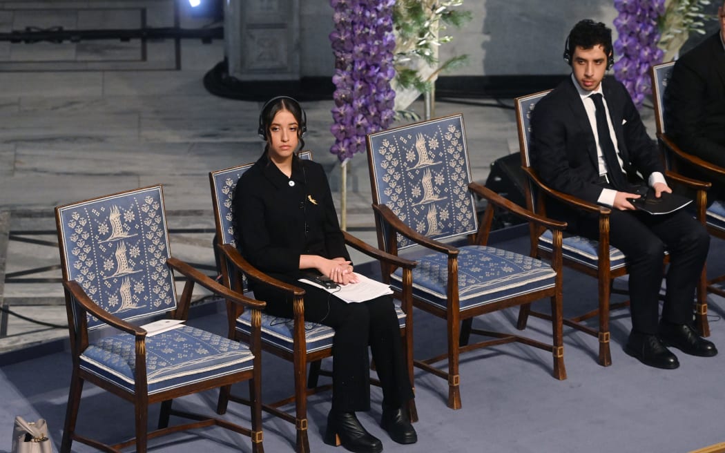 OSLO, NORWAY - DECEMBER 10: Nobel Peace Prize laureate Iranian activist Narges Mohammadi's daughter Kiana Rahmani and son Ali Rahmani attend the Nobel Peace Prize ceremony at Oslo City Hall on December 10, 2023 in Oslo, Norway. (Photo by Rune Hellestad/Getty Images)