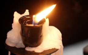 Forty candles were lit at the service, one for every year of Jonah Lomu's life.