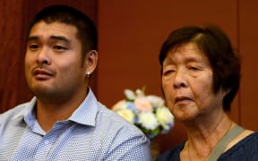 Michael Chan (L) and Helen Chan (R) - -the brother and mother of Australian on death row Andrew Chan deliver an emotional appeal to Indonesian authorities.
