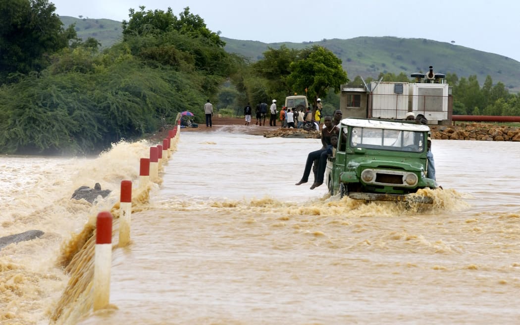 A car crossing during flooding in Sauga on the Gorom Gorom track in September 2020.