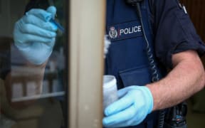 Police forensic team.