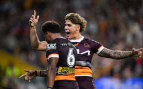 Reece Walsh celebrates with Ezra Mam.