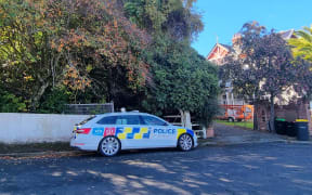Police at Garfield Avenue in Dunedin, where a person was found dead on 16 April, 2024.