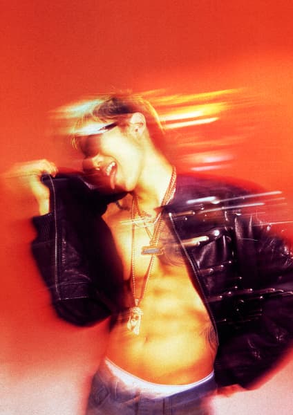 An artistic shot of Jay Park grooving in a leather jacket.