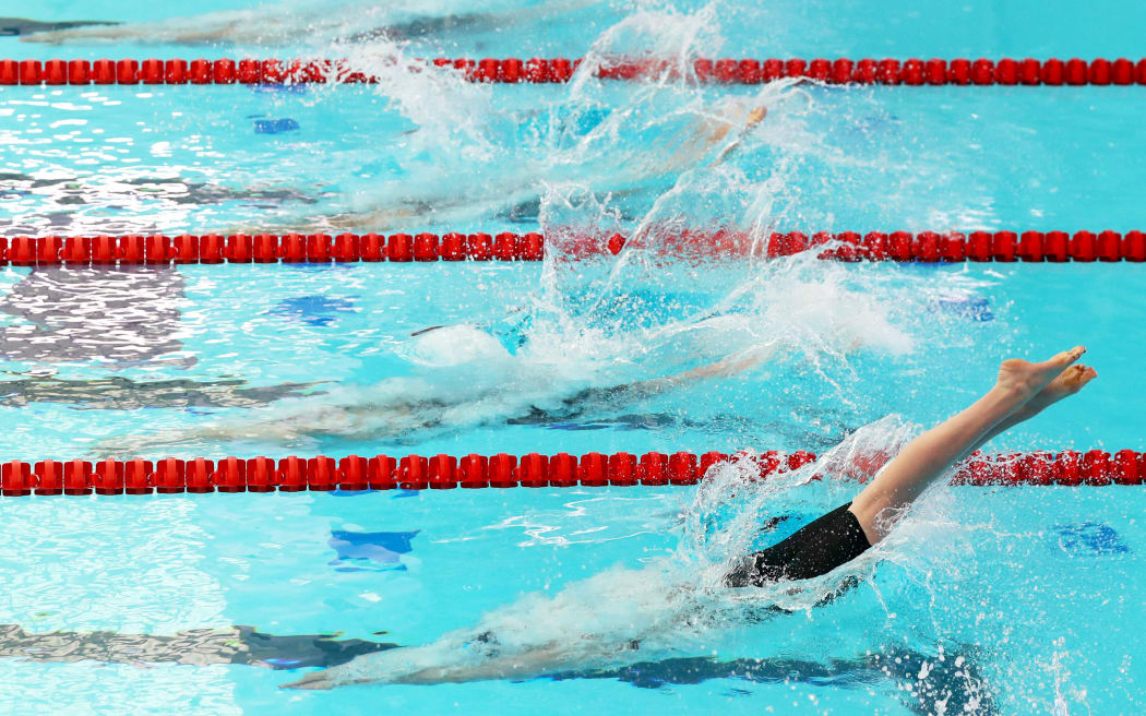 Swimmers dive in the water during the women's 200m freestyle heats at the TYR Pro Swim Series at San Antonio on 5 March 2021 in San Antonio, Texas.