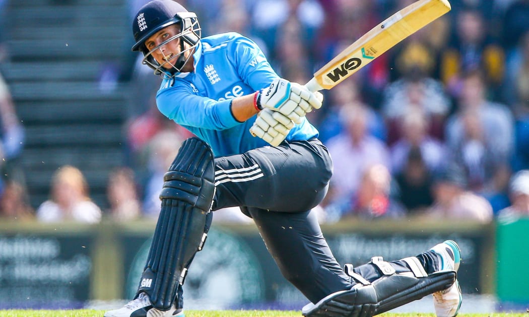 England cricket team batsman Joe Root sweeps a shot high into the air.