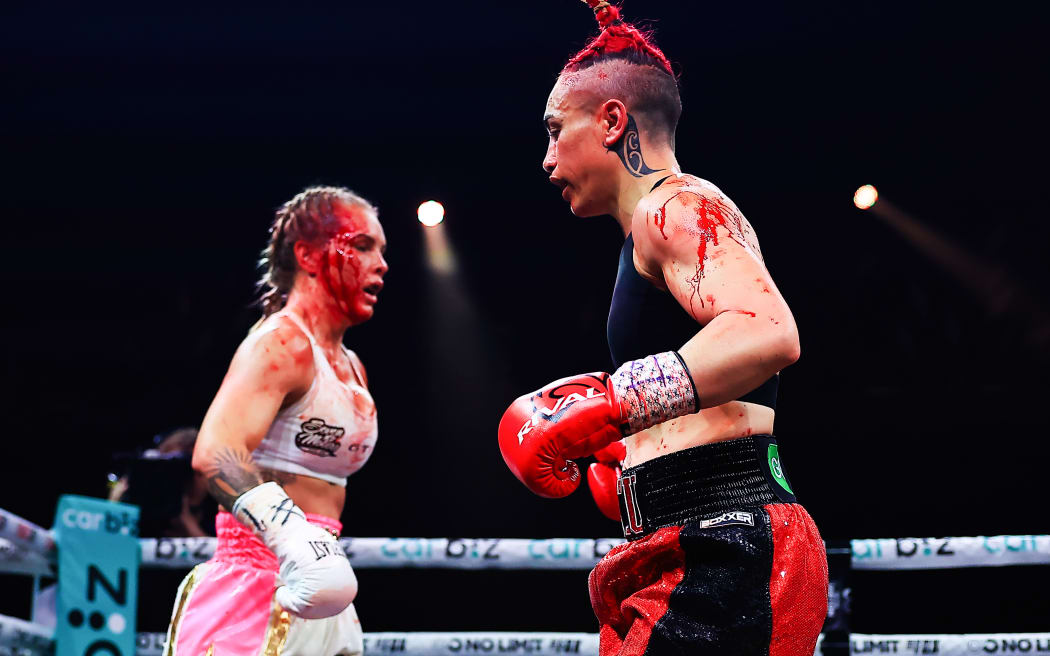 Blood pours from the hairline of Shannon O’Connell during in the Catchweight fight against Mea Motu in Sydney.