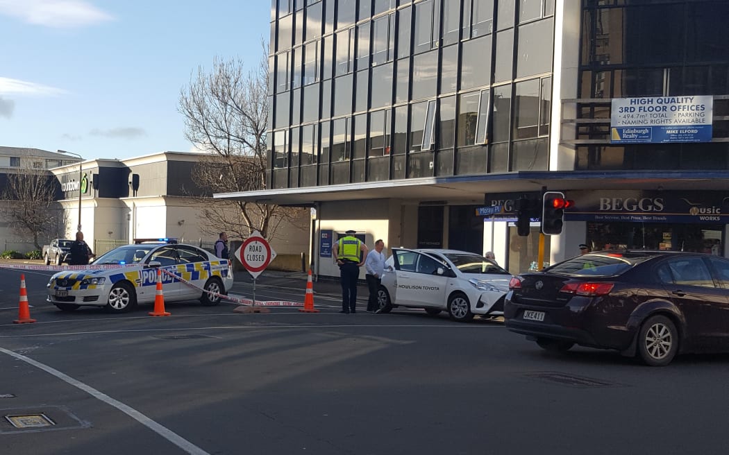 Police at the cordon after the suspicious package was found in Dunedin city centre.