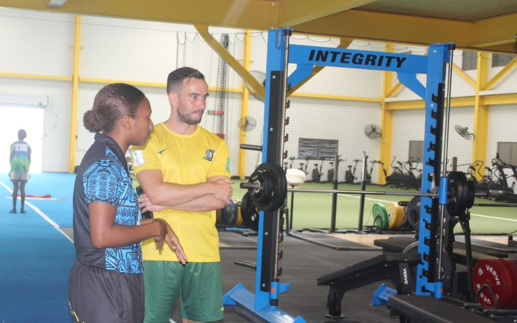 ‘Kurukuru’ national Futsal team Head Coach Damon Shaw and SINIS High Performance Manager (PM) for Portfolio Two (Team Sports) Amanda Korinihona touring SINIS.