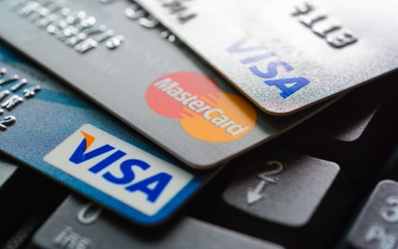 AB Corp produces bank and loyalty cards.