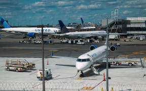 NEWARK, NEW JERSEY - JUNE 02: Planes sit on the tarmac at Newark Liberty International Airport following a news conference by Transportation Secretary Sean Duffy at the airport, where he announced the reopening of a major runway at the airport, nearly two weeks ahead of schedule on June 02, 2025 in Newark, New Jersey. Delays and cancellations have plagued Newark, one of the nation's busiest airports, for months. Air traffic control outages, runway construction, and an announcement by United Airlines that over 20% of FAA controllers at Newark walked off the job have all contributed to the delays.   Spencer Platt/Getty Images/AFP (Photo by SPENCER PLATT / GETTY IMAGES NORTH AMERICA / Getty Images via AFP)