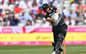 Sophie Devine batting.