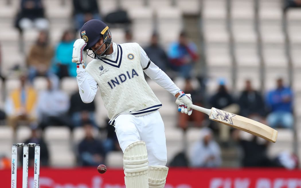 Shubman Gill of India is hit on the head by a delivery from Kyle Jamieson of New Zealand
New Zealand BlackCaps v India.
Day 2 of the ICC World Test Championship Final at Southampton, England on Saturday 19th June 2021.
Copyright photo: Matthew Impey / www.photosport.nz