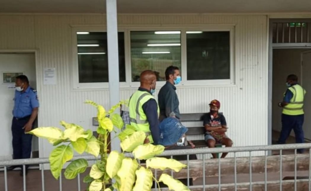 52-year old Italian citizen and captain of the yacht MV Badu, Carlos Attansio. heads to court in Papua New Guinea, charged with smuggling drugs, 11 August 2020 .