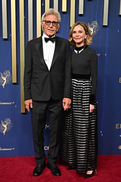 US actor Harrison Ford (L) and US actress Calista Flockhart arrive for the 77th Primetime Emmy Awards at the Peacock Theatre at LA Live in Los Angeles on September 14, 2025. (Photo by Frederic J. Brown / AFP) / RESTRICTED TO EDITORIAL USE