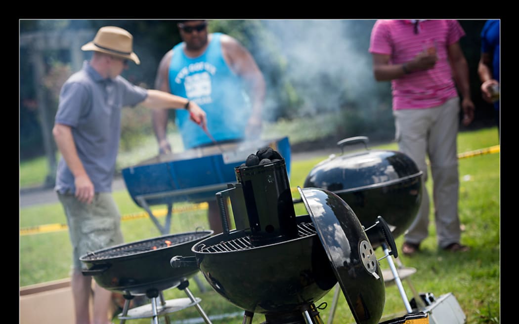 Photo of people BBQing at Braai Day