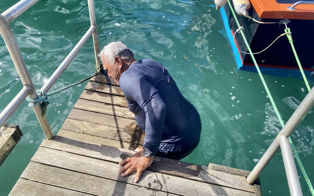 Dick Masters arrives back from fishing trip in Rarotonga empty handed.