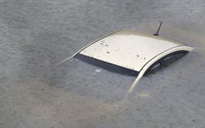 A submerged car on an Interstate in Houston.