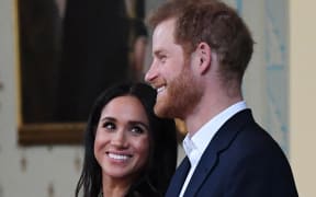 Prince Harry and Meghan, Duke and Duchess of Sussex, attend a reception at Government House in Melbourne on October 18, 2018.