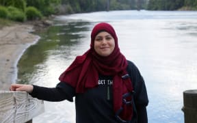 Shaymaa Arif on the riverside of the Waikato.