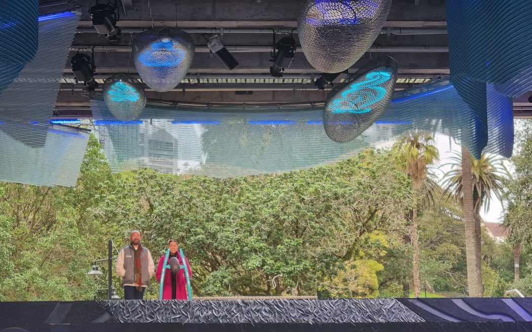 Tarumai-i-Tawhiti Kerehoma Hoani and Graham Tipene performing at new interactive sculpture in Auckland central.