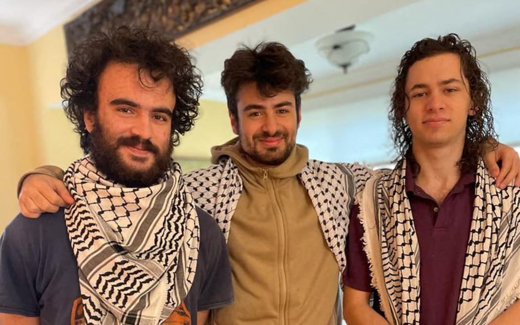 This undated handout photo provided by the Institute for Middle East Understanding shows Hisham Awartani, Tahseen Ali, and Kenan Abdulhamid, who were shot on their way to a family dinner.