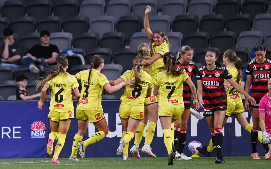 The Phoenix celebrate Mariana Speckmaier’s goal during their A-League women’s win over Western Sydney Wanderers.