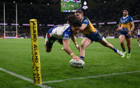 Dallin Watene-Zelezniak of the Warriors scores a try during the NRL Round 19 match between the Parramatta Eels and the New Zealand Warriors.