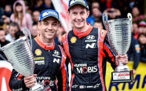 Hayden Paddon and Seb Marshall after finishing second at the Rally of Poland.