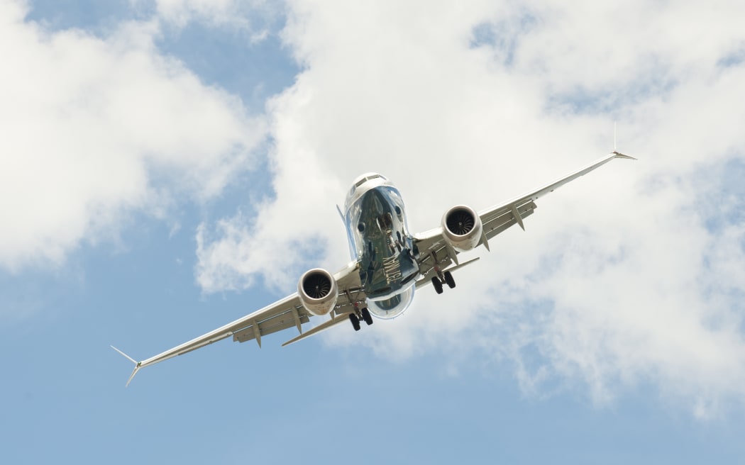 Boeing 737 MAX on a steep angled landing descent to Farnborough Airport, UK.