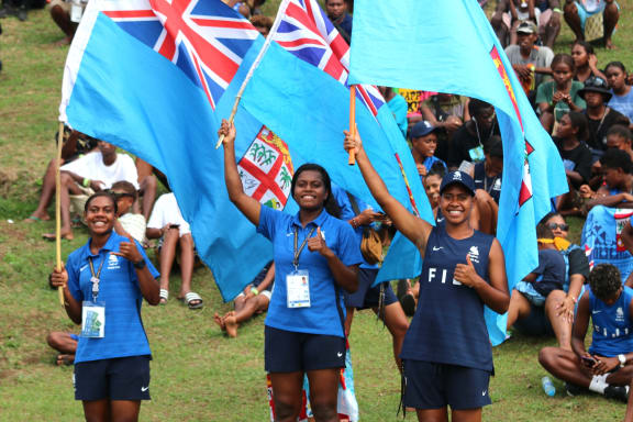 Pacific Games football semi-finals: Team Fiji create an island of blue surrounded by a sea of green supporters in the Solomon Islands vs Fiji semi-final at Lawson Tama Stadium in Honiara. 28 November 2023.  Credit RNZ Pacific/Koroi Hawkins