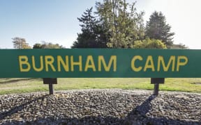 One person has died after a fire at a housing block at Burnham military camp, just outside of Christchurch.