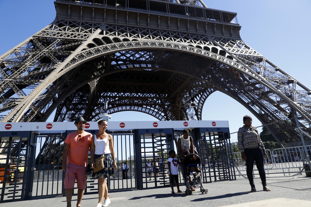 Security gates were put up at the Eiffel Tower last year. A 2.5 meter-high bullet-proof glass is to be set around the Eiffel Tower to protect it and secure its access later in 2017.