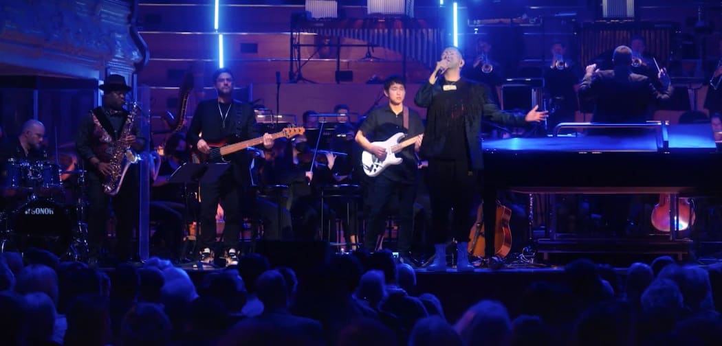 Rob Ruha performs with band and the Auckland Philharmonia Orchestra in Auckland Town Hall
