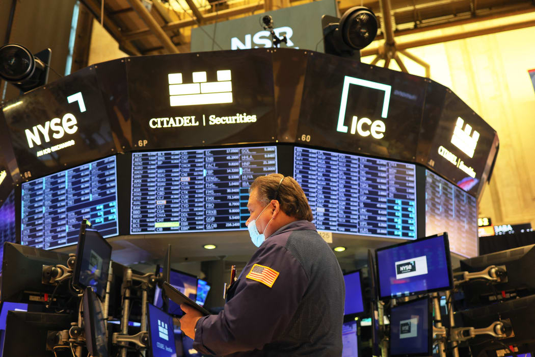 Traders work the floor of the New York Stock Exchange during morning trading on 5 May 2022 in New York City.