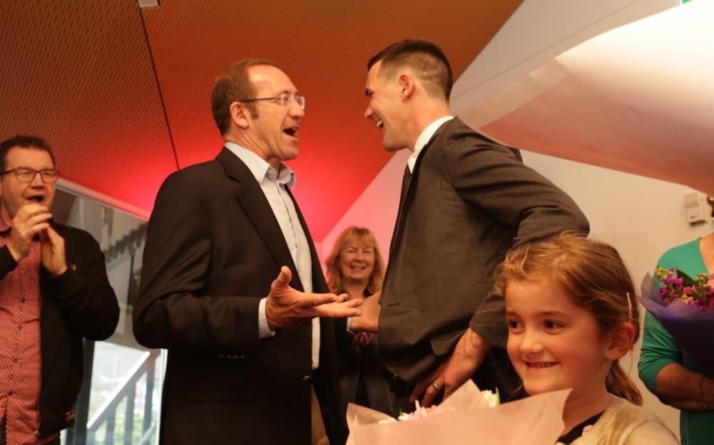 New Wellington mayor Justin Lester, who ran on a Labour Party ticket, is greeted at his victory party by Labour leader Andrew Little.