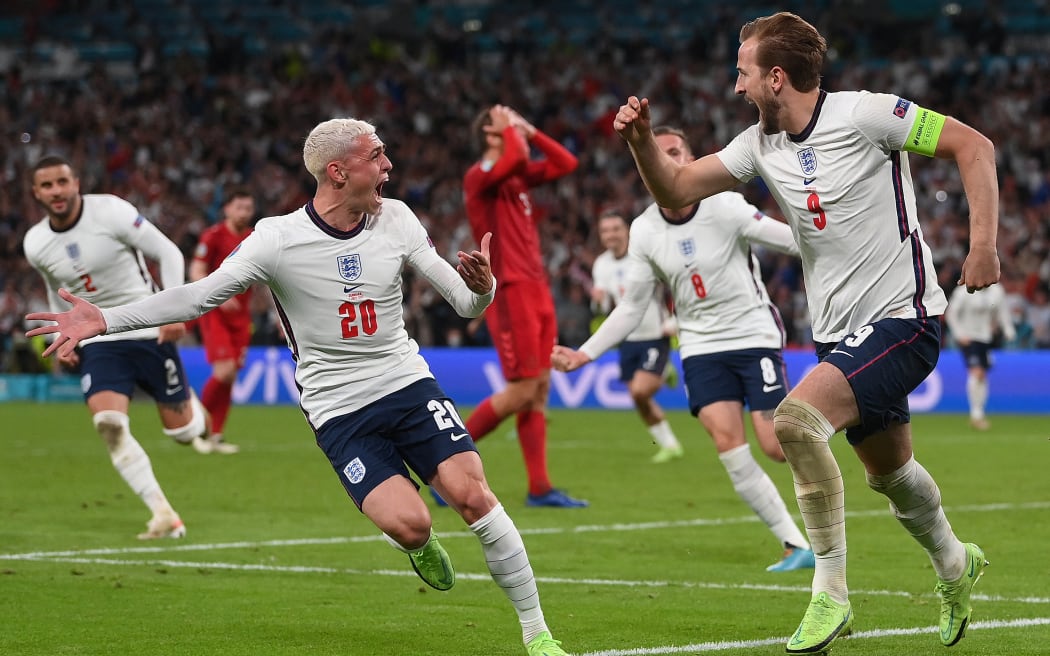 England's forward Harry Kane celebrates after scoring a goal during the UEFA EURO 2020 semi-final football match between England and Denmark at Wembley Stadium in London on July 7, 2021.