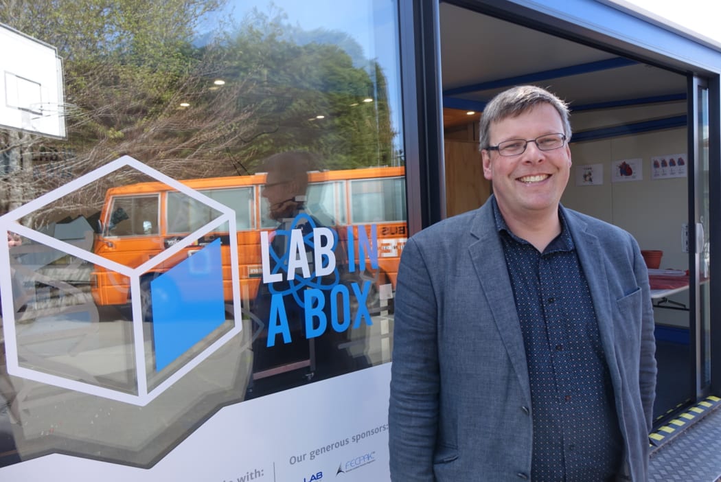Associate Professor Peter Dearden, director of Genetics Otago, who dreamed up and has led the project, in front of the lab at Kaikorai Primary School.