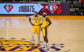 Los Angeles Lakers players Anthony Davis (L) and LeBron James.